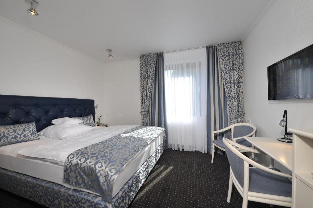 Hotel Spiegel Colónia Quarto foto